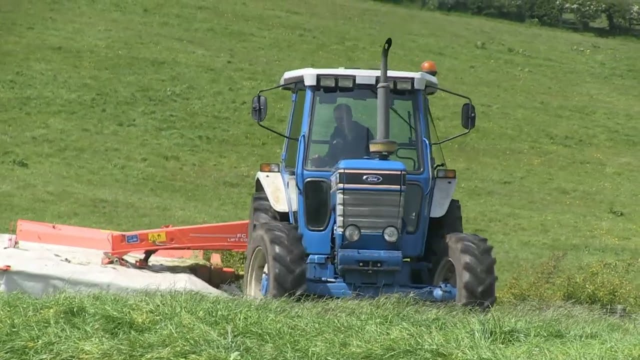 FORD 7710 II AND KUHN FC243 MOWER CONDITIONER