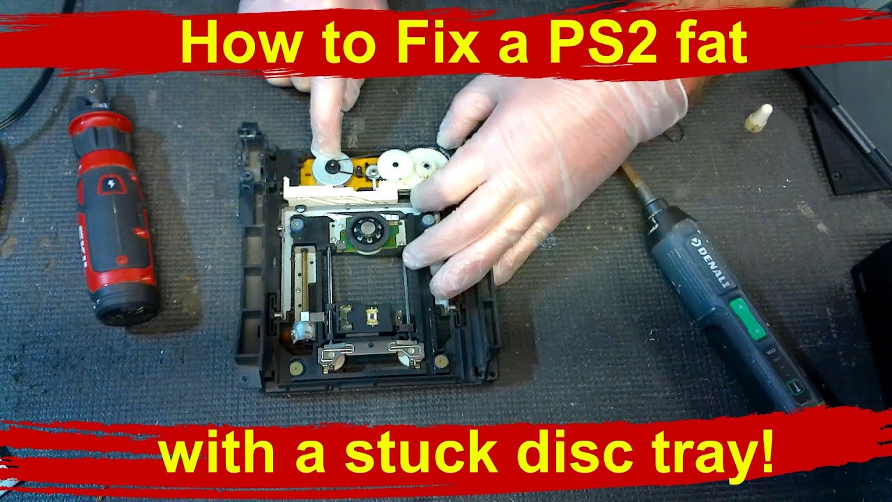 How to fix a PS2 fat disc tray that won't open PlayStation 2 stuck DVD CD disk drive repair tutorial