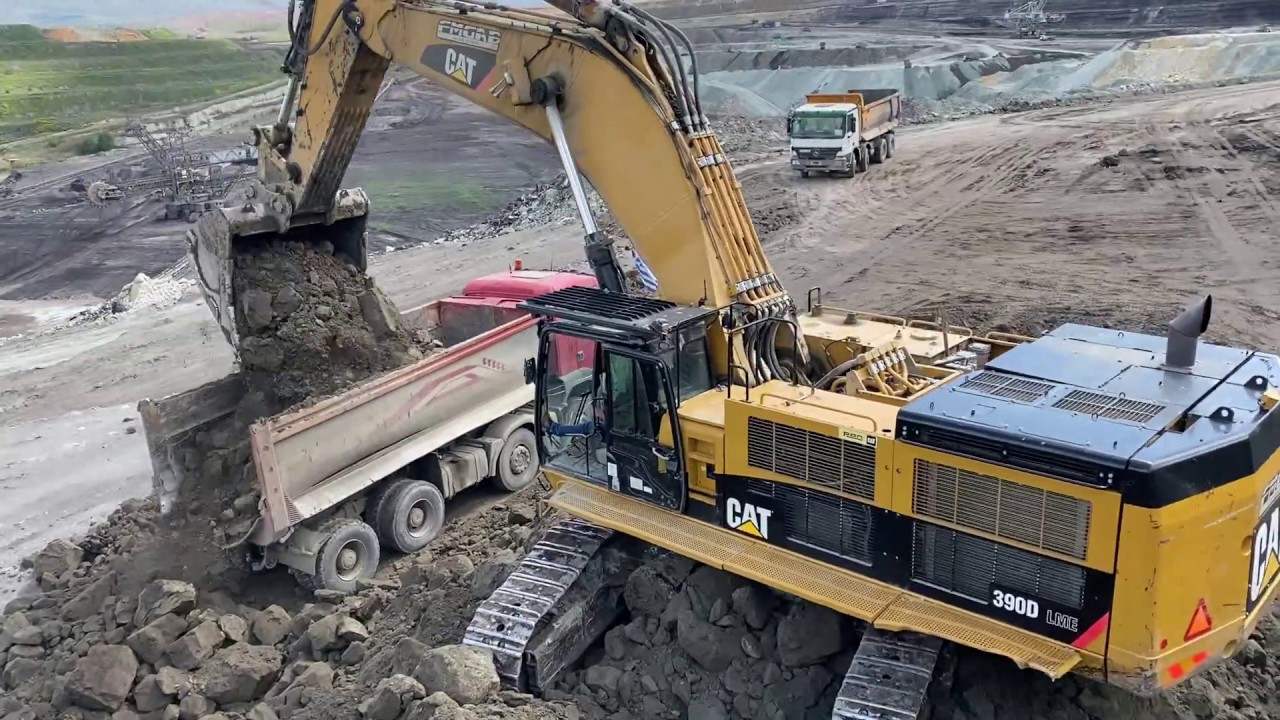 Caterpillar 390D Excavator Loading Trucks - Pyramis Ate