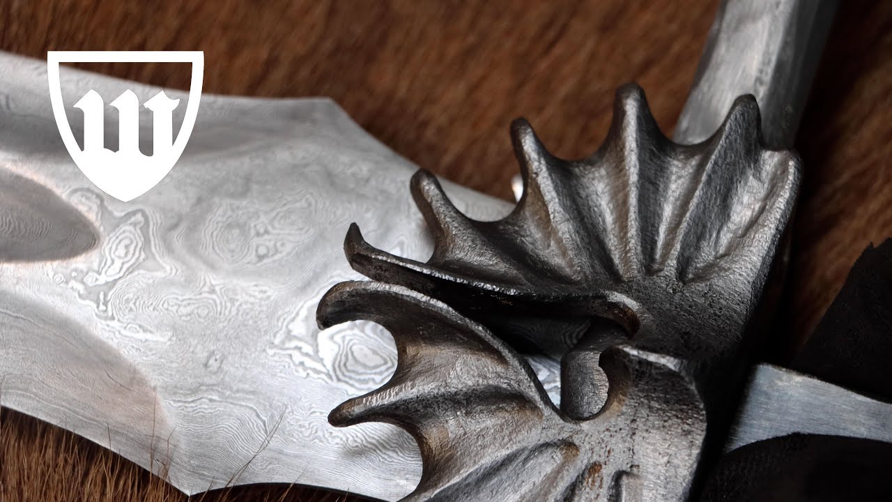 Forging the House of Dragon sword, part 3, sculpting the dragon wing chappe.