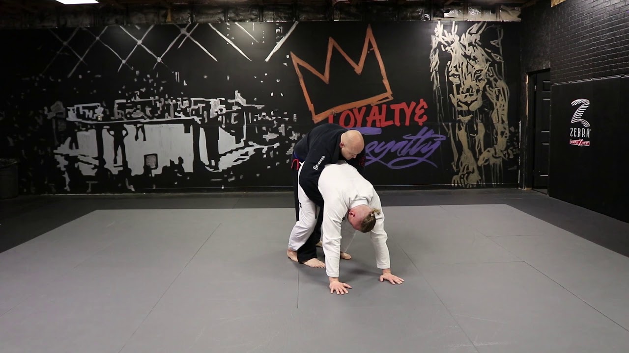 Helio Gracie Self Defense #54 Rear Bear Hug Under Arms Defense (With Lift)
