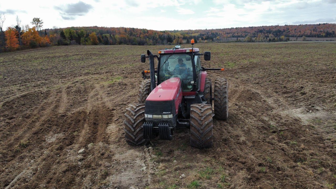 CASE  MX270 Working Down Field Tile Drainage Runs 