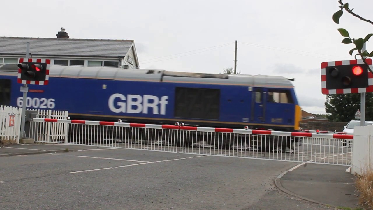 Class 60 passes Level Crossing at Bedlington