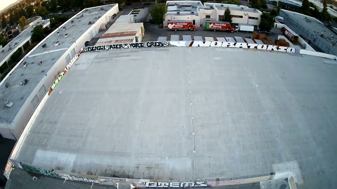 windy day drone footage of some San Fernando valley graffiti 