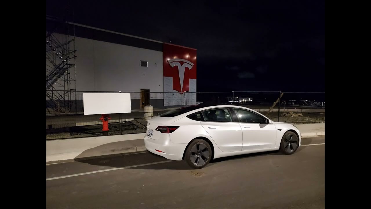 Frank's Messy Tesla at New Tesla Shop Night and Day