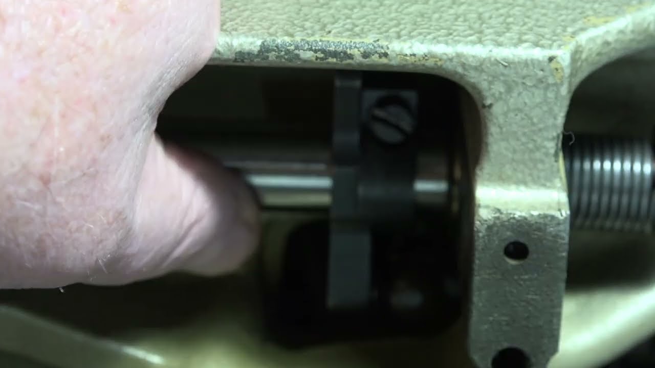 Adjusting the reverse level spring tension on Pfaff 463