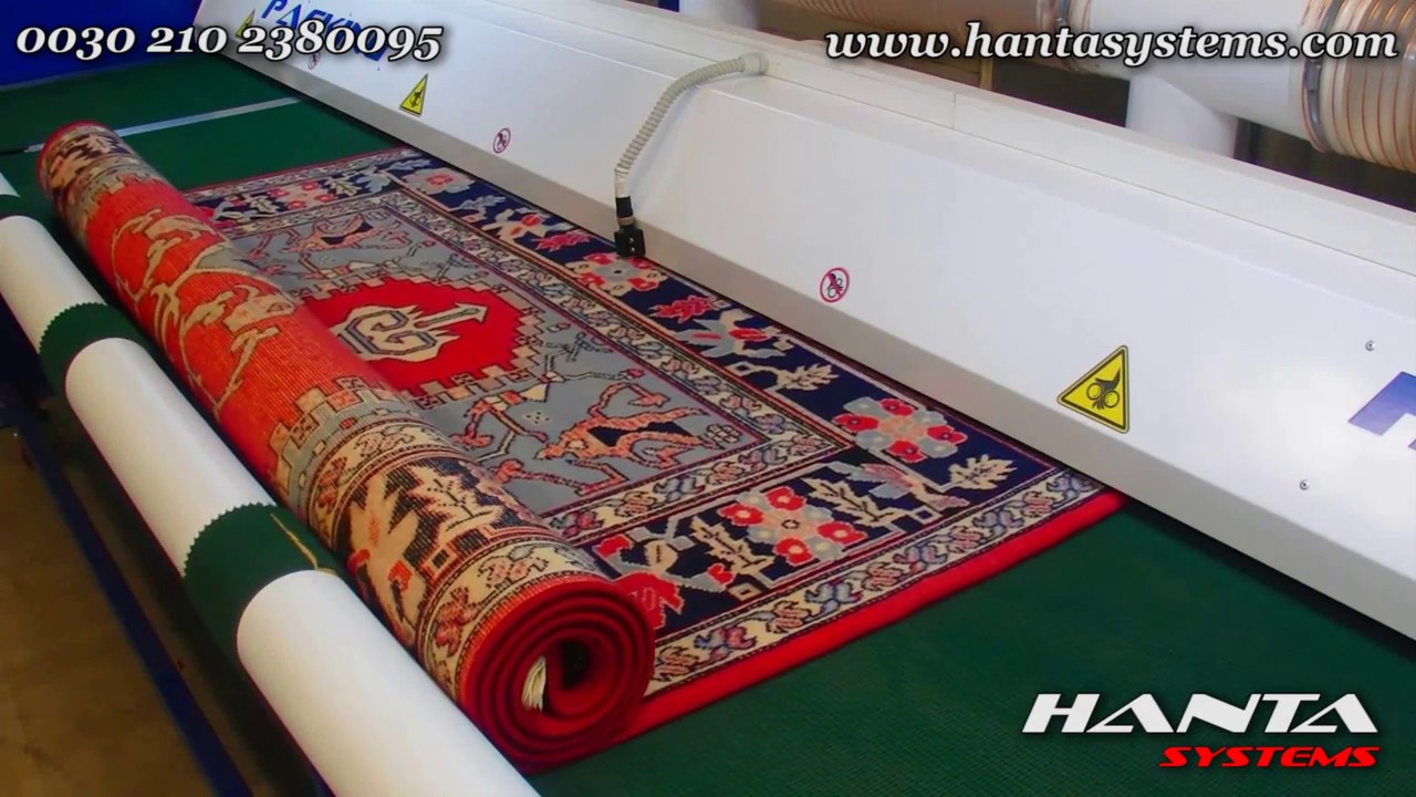 Hanta Systems: Automatic carpet and rug packing machine