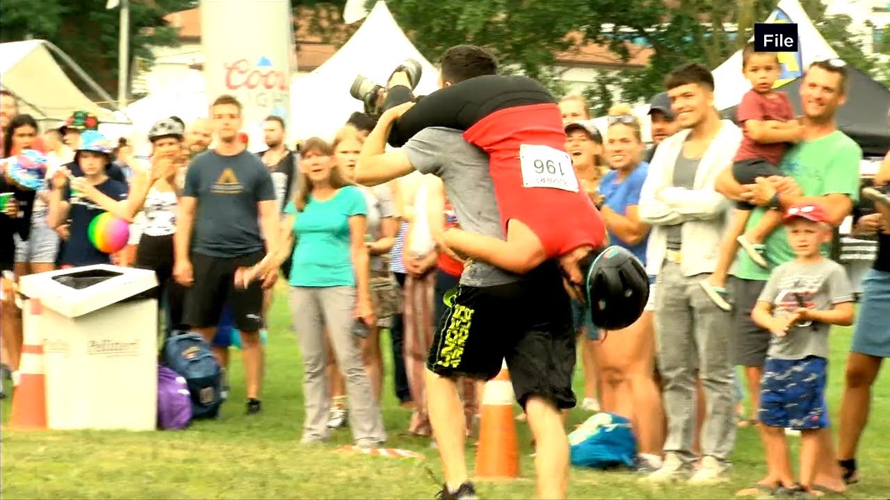 Wife-carrying competition highlights Fourth of July celebration in Monona