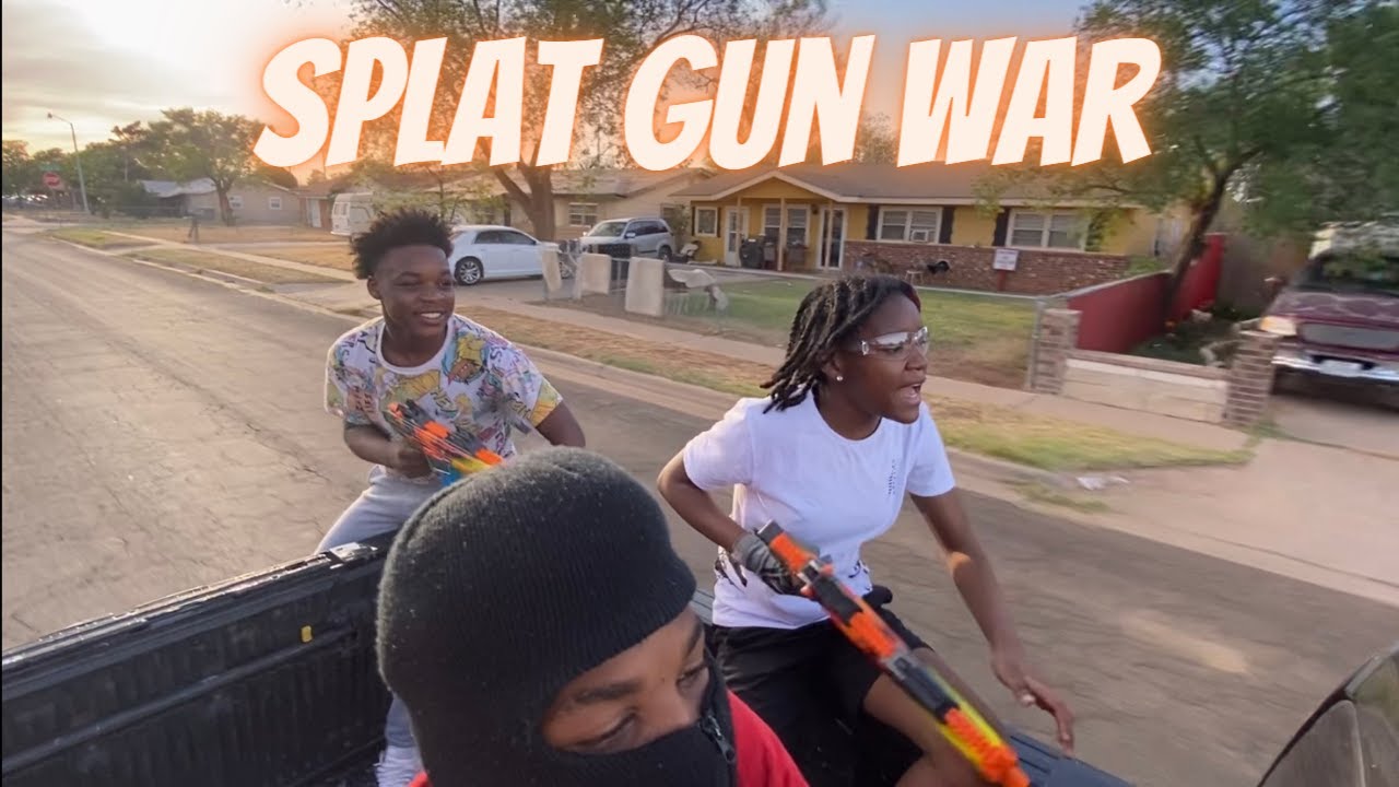 rolling up in the hood pulling at splat guns