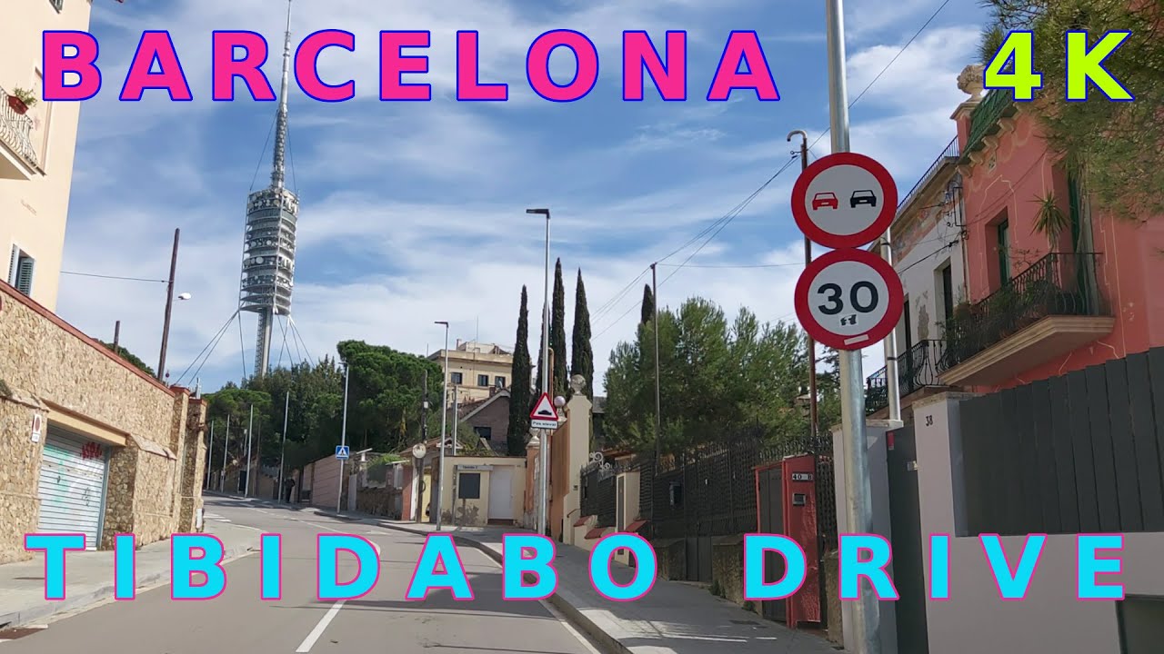 BARCELONA drive over Tibidabo mountain 4K: aerial view over the city covered with Sahara DUST