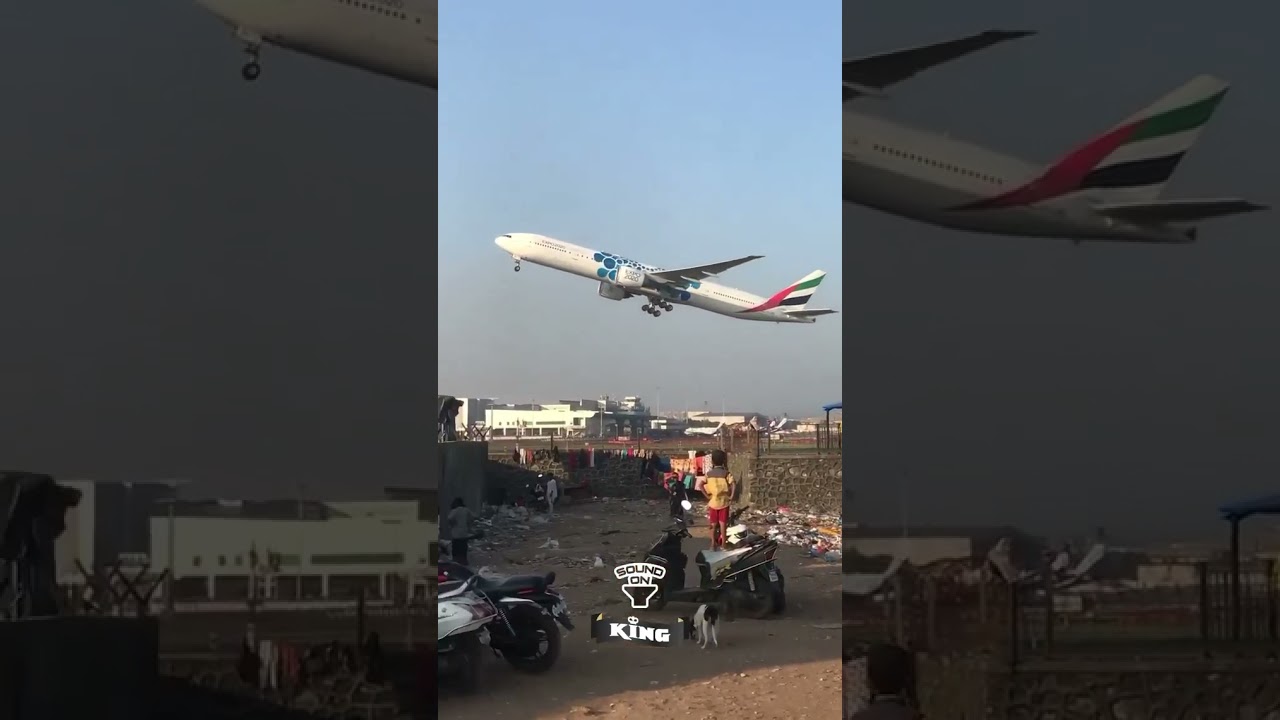 Emirates B777 roaring past Mumbai’s slums to the land of millioners. 🛫.  
