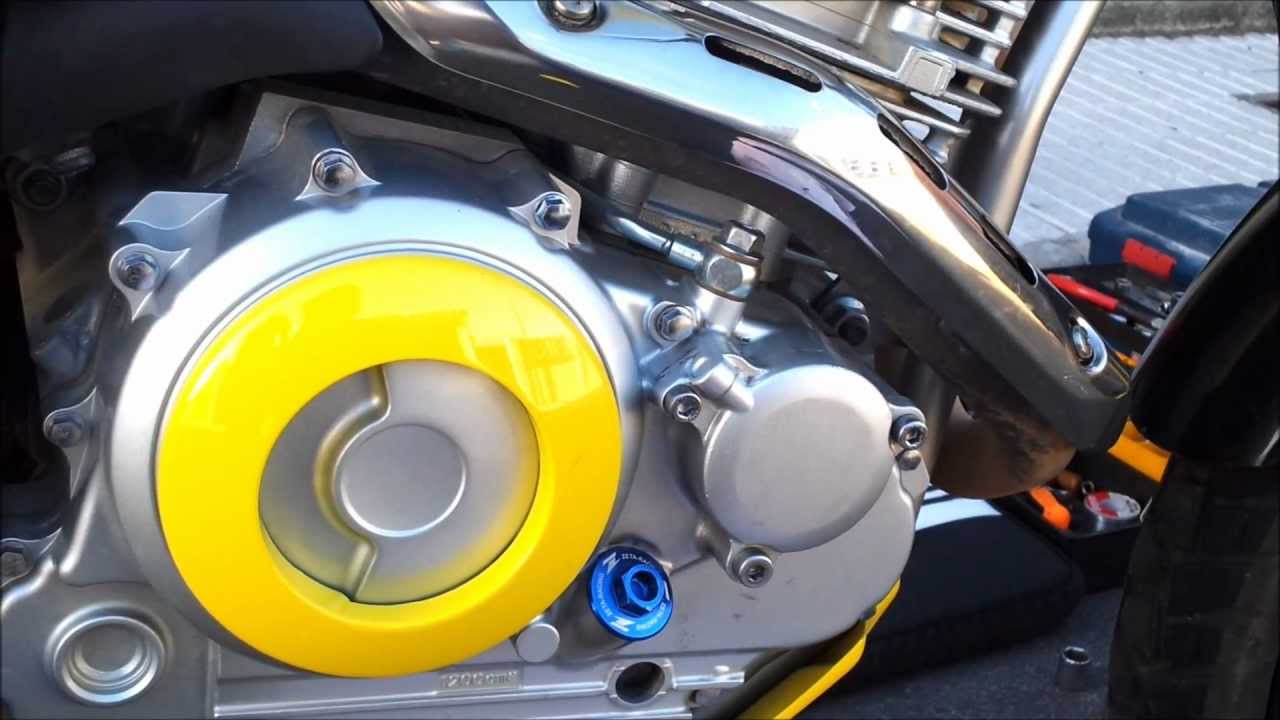 yamaha tricker cambio de aceite y filtro.wmv