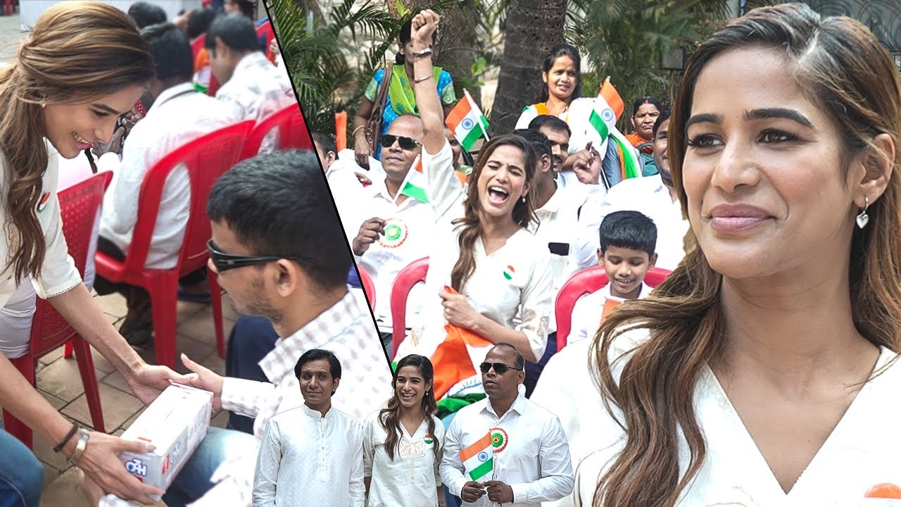 Poonam Pandey Hosting The Flag With Blind Individuals And Special Children From NGO On Republic Day