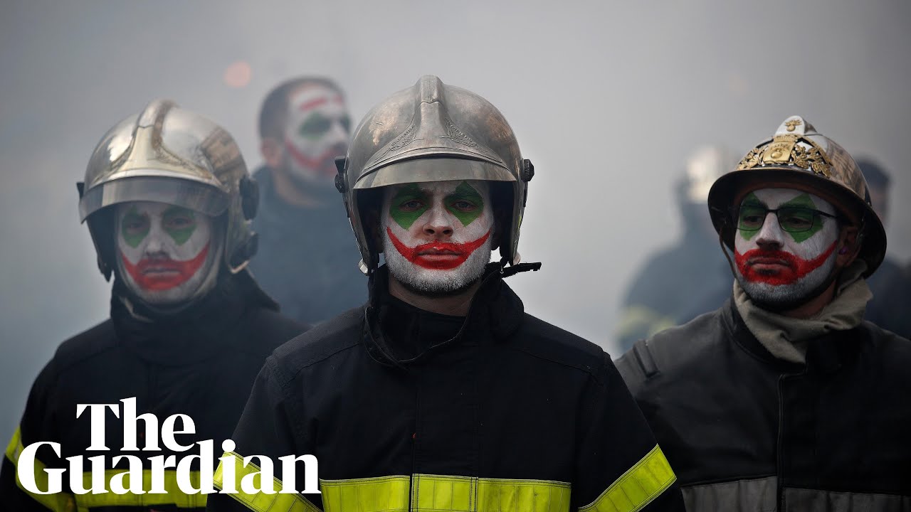 Firefighters clash with riot police in France protests