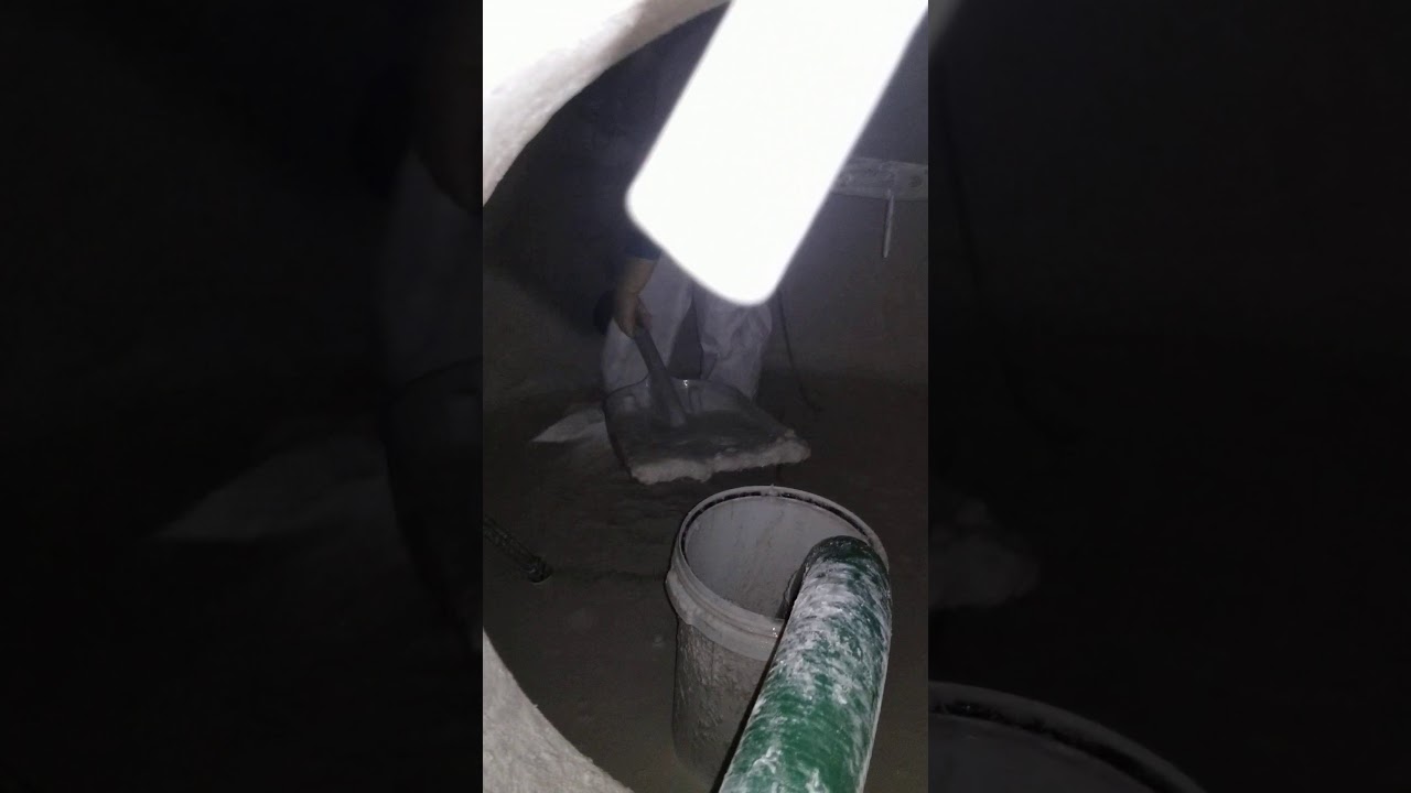 Lime, sulfuric and hydrofluoric acid waste tank cleaning