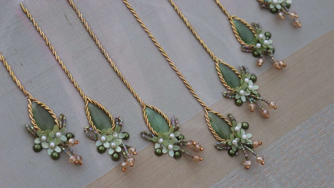 Cabochon type stone embroidery