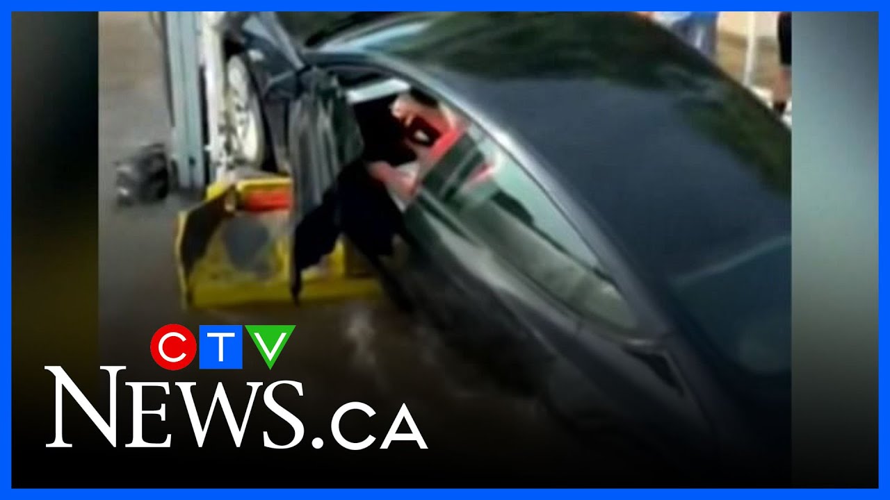 Tesla exiting Quebec ferry falls into water with driver inside