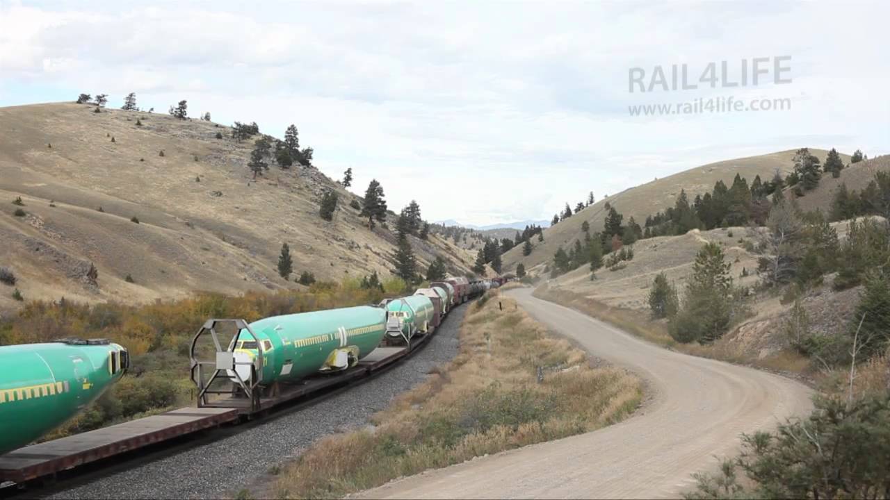HD freight train with airplanes on Mullan Pass at Helena, Montana