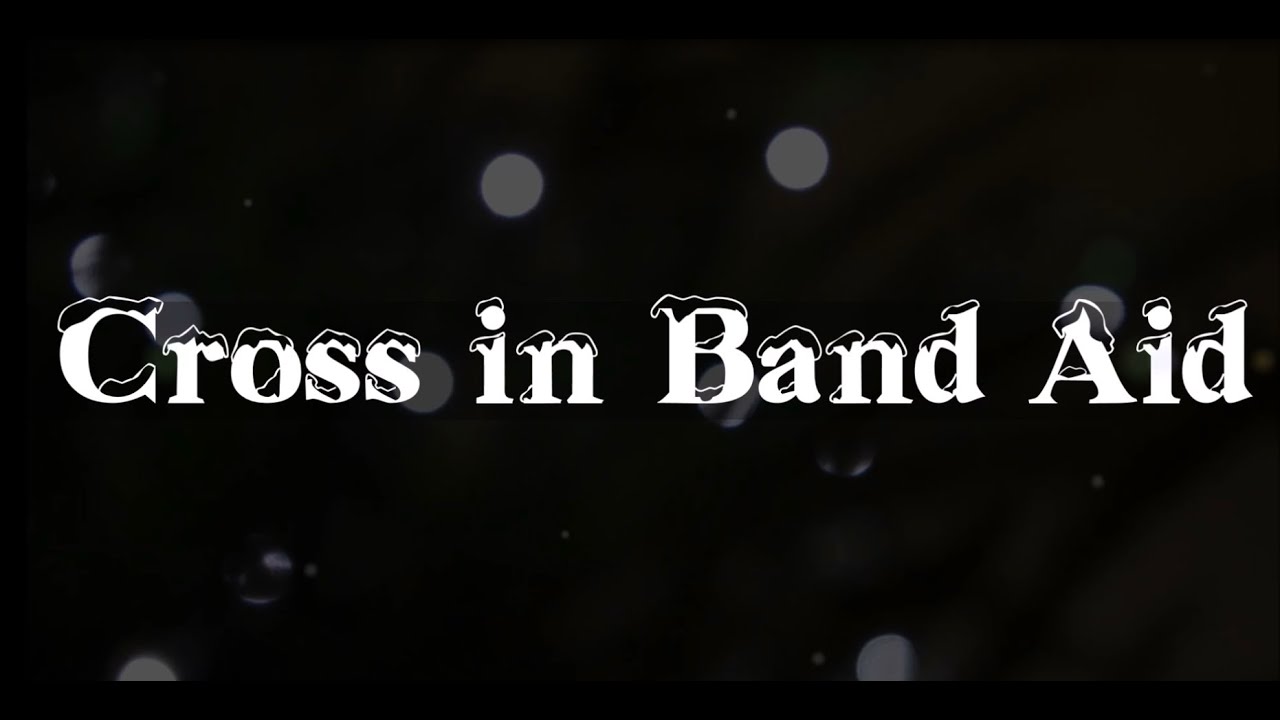 Cross in Band Aid - Feed the World