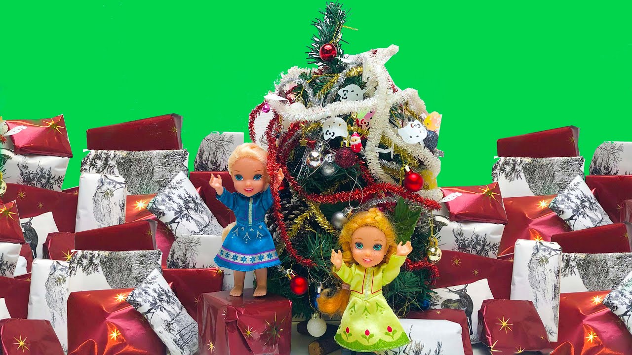 Elsa and Anna toddlers open their Christmas presents