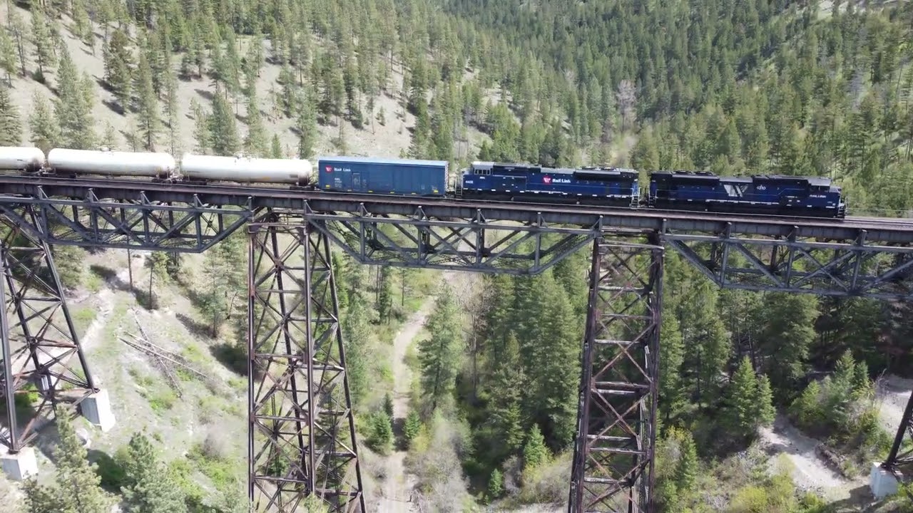 Montana Rail Link Gas Local Evaro, MT Marent Trestle - 4K Aerial Cinematic