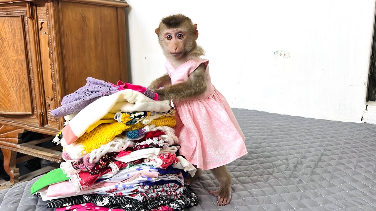 Tina helps her mother put away the new clothes that fans gave her.