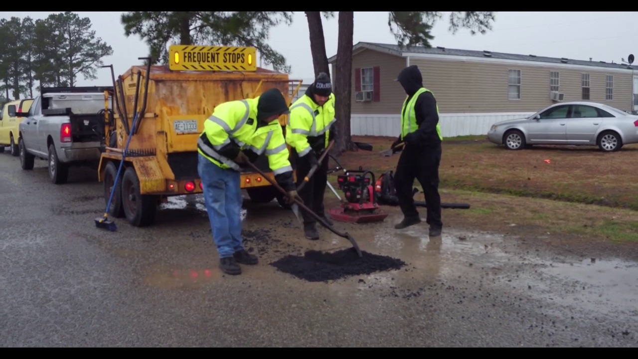 EZ Street Works in Water, Patching Potholes in the Rain Without Removing the Water