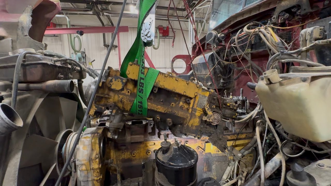 Injection pump removal on Cat 3406B.