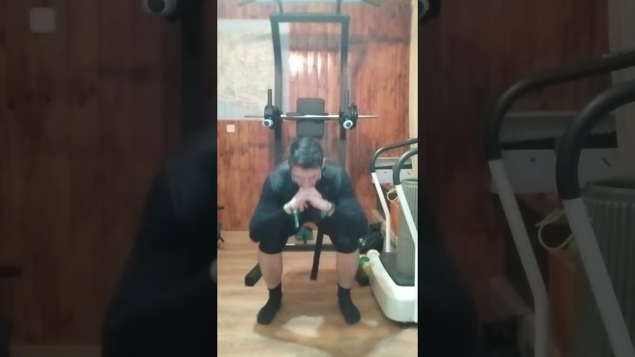 50 sentadillas en 1 min con un chaleco de 8 kilos #pierna