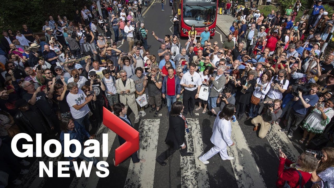 Beatles' fans flock to Abbey Road for album cover's 50th anniversary