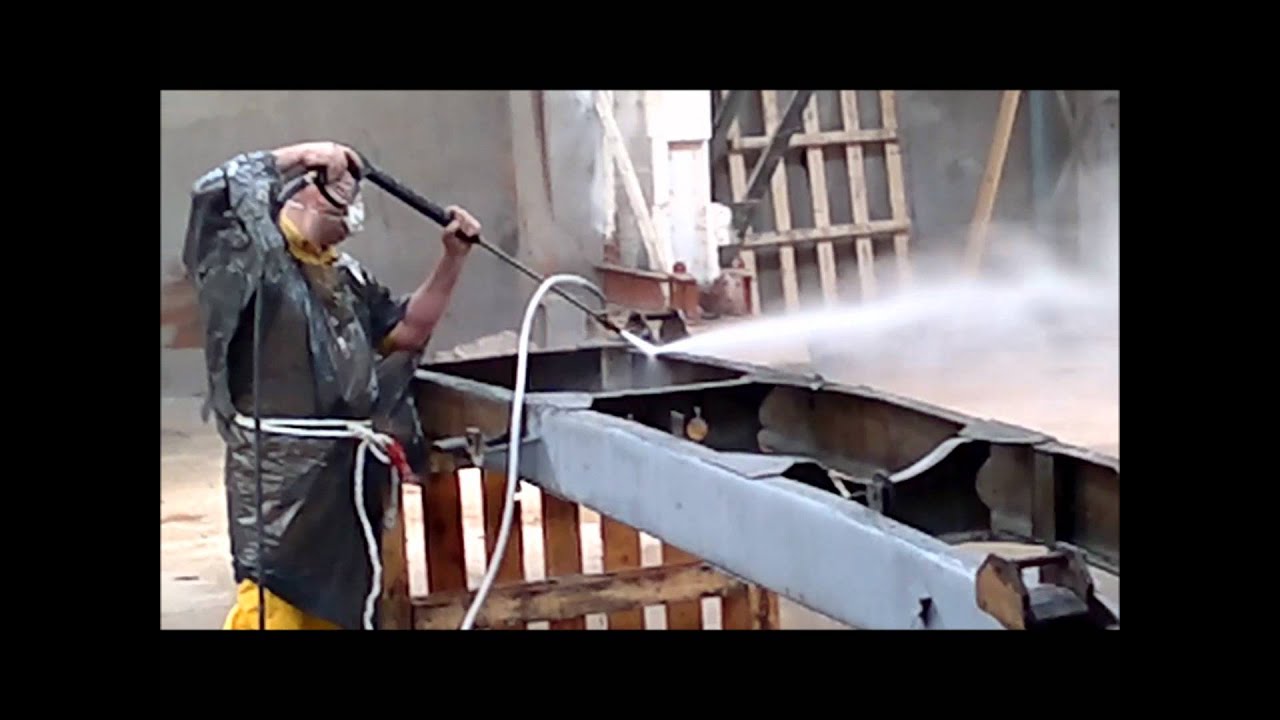 Homokfúvás nagynyomású mosóberendezéssel.