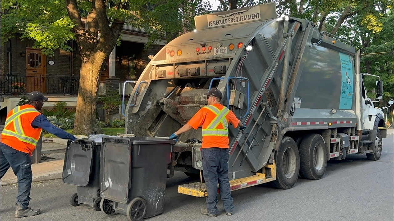 International Chagnon Rear Loader Garbage Truck Packing Heavy Trash on The Night Route