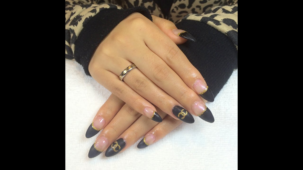 Edgy Matte Black Gel Nails with Nail Art