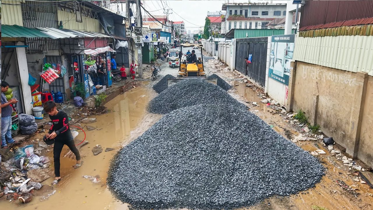 Continue!! Repair old road in village spreading gravel by mini Komatsu d20p dozer & HINO 25t trucks 