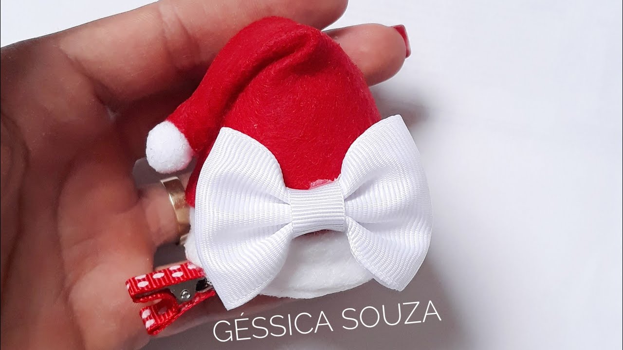 Gorro de Papai Noel(laço natalino no bico de pato)
