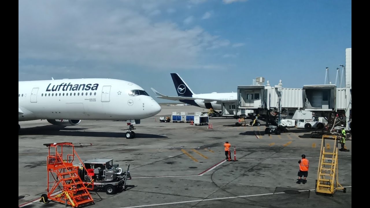 LH 446 arrives DEN from FRA.  20 June 2021. A350-941 D-AIXI.  Parks next to sister D-AIXL from MUC.