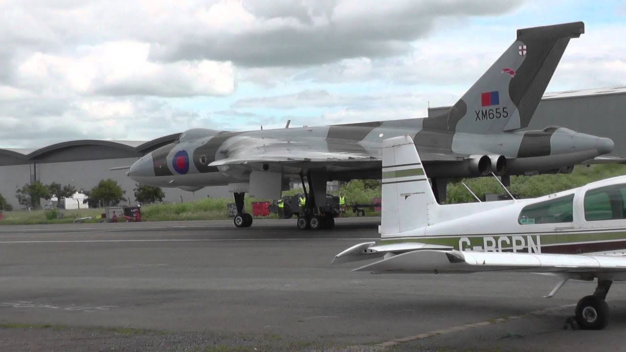 Wings and Wheels 2015 featuring Vulcans XH558 and XM655