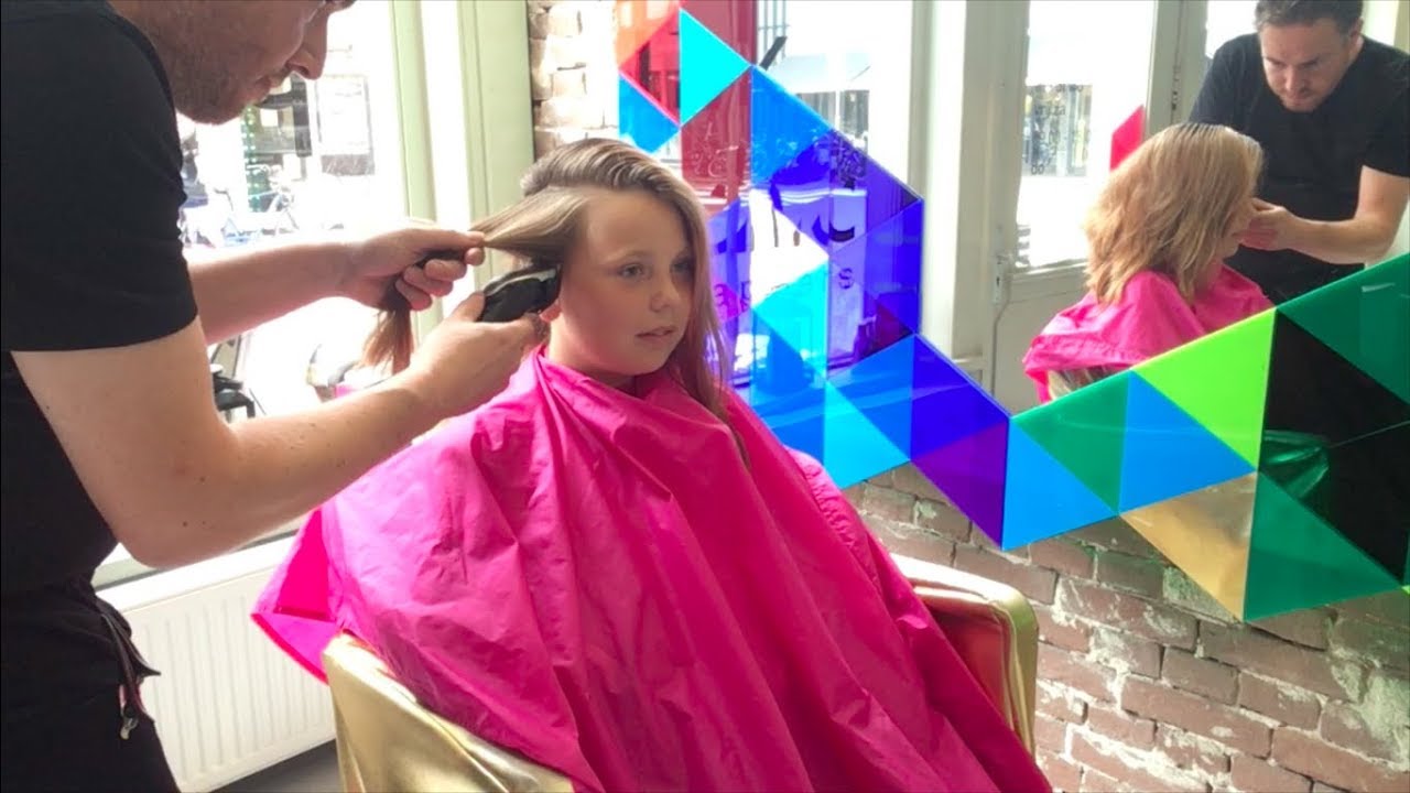 A graduated bob haircut with  a side shave