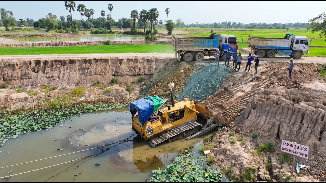 Incredible Road Building Project Using KOMATSU D60 and 25-Ton Dump Trucks