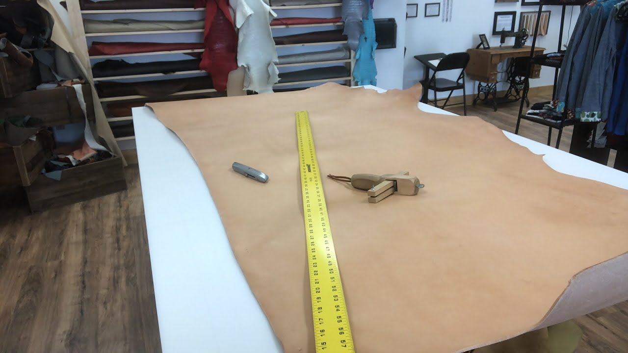 Cutting into a new side of Herman Oak Leather.
