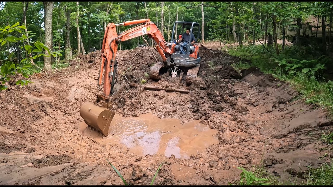Welding an excavator bucket and digging pond