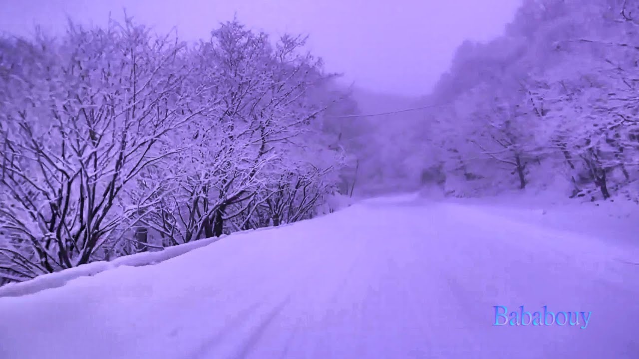Driving Through A Winter Storm With Blizzard Howling