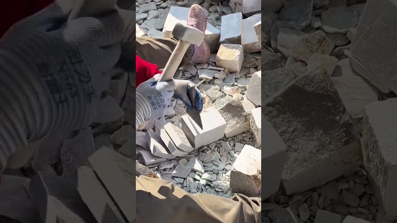 Shaping Stone Blocks Manually using a hammer and chisel to refine rough edges for construction