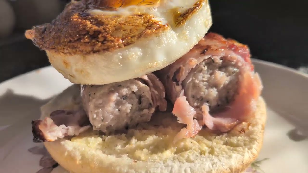 PIG IN BLANKET EGG ON TOP IN A ROLL