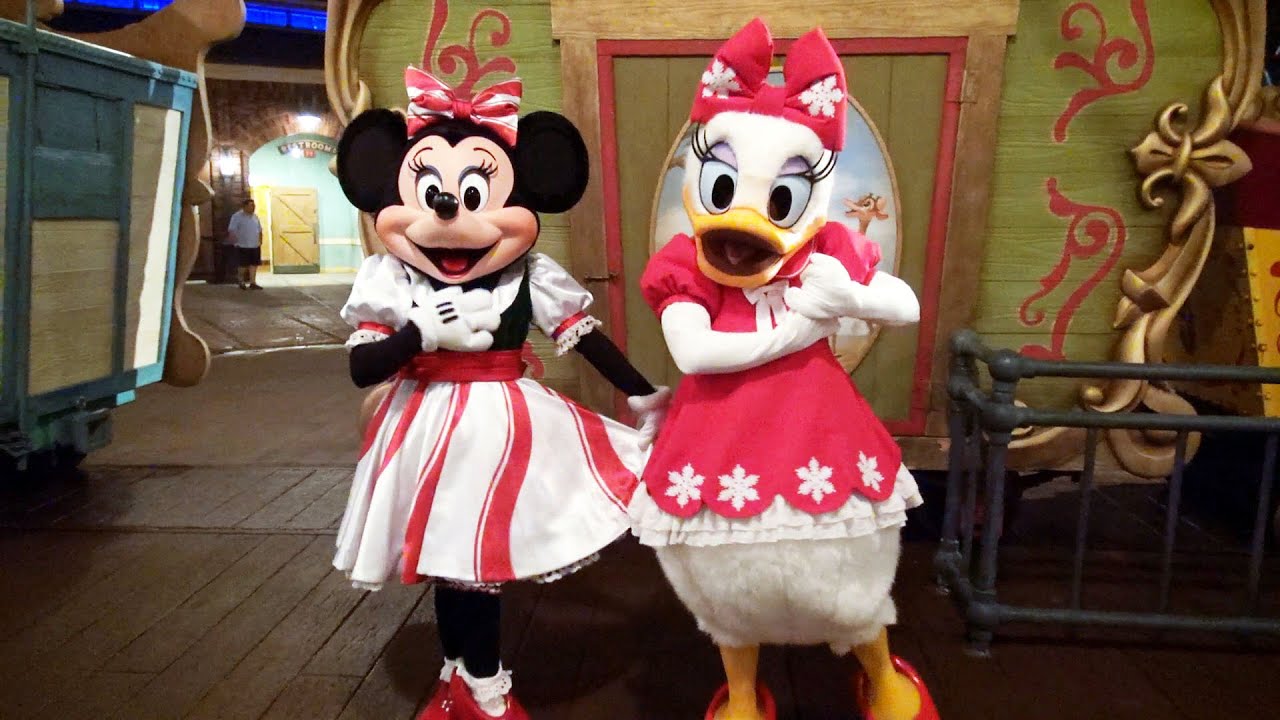 Minnie Mouse and Daisy Duck in Christmas Outfits meet at Mickey's Very Merry Christmas Party 2015