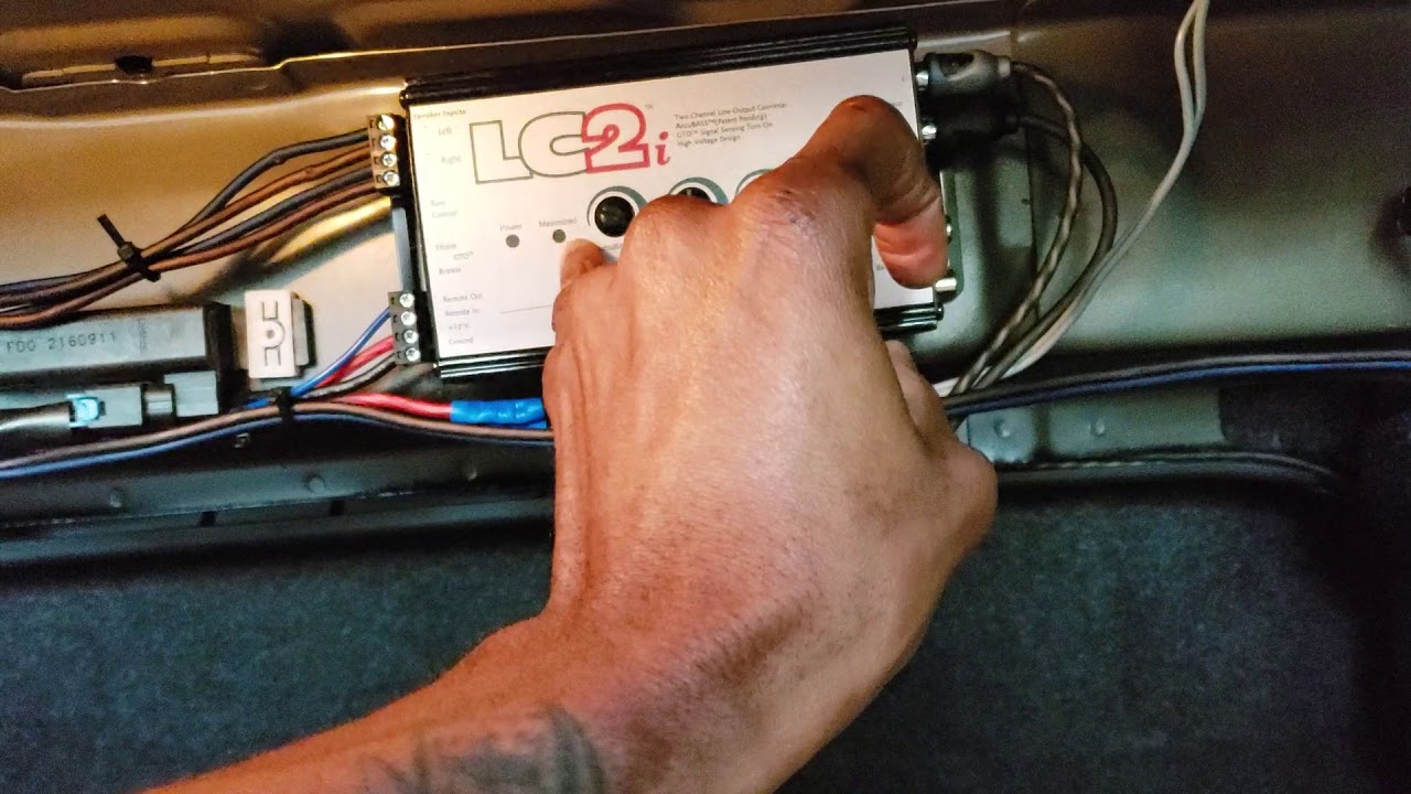 How To Install An Amp and Subwoofer On A Stock Factory Stereo/Radio Using a LC2i Line Out Converter
