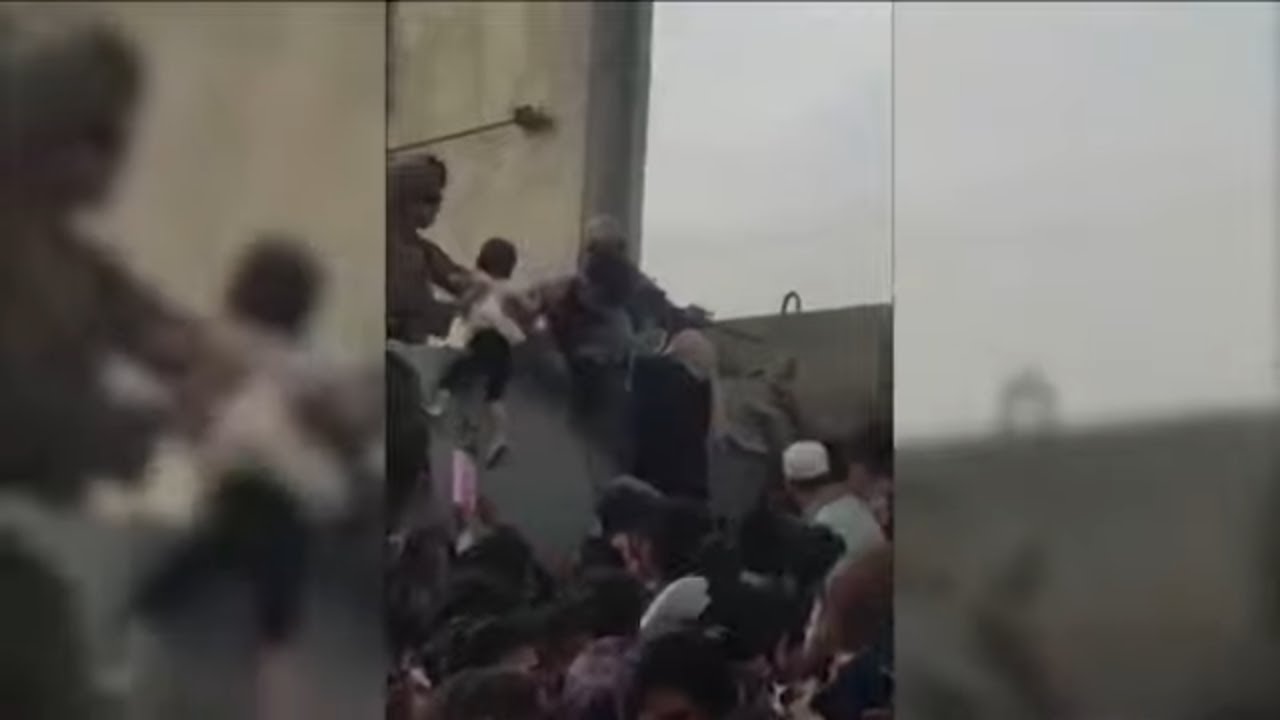 More Heart Breaking Footage of Desperate Afghans Handing Babies to Troops at Kabul Airport