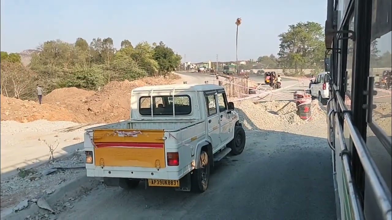 Bus journey on working road and turns- overtaking