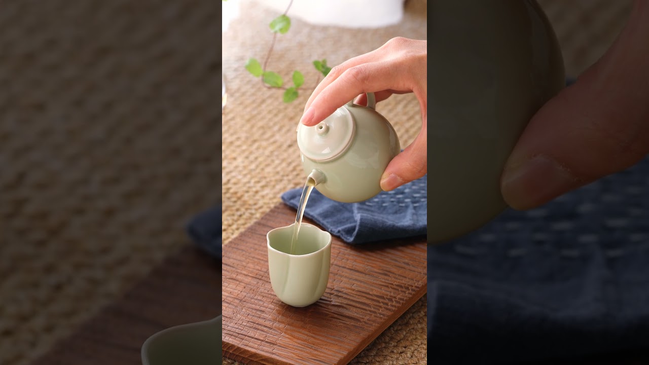 Ou Kiln Five-Petal Blossom Rim Teacup.