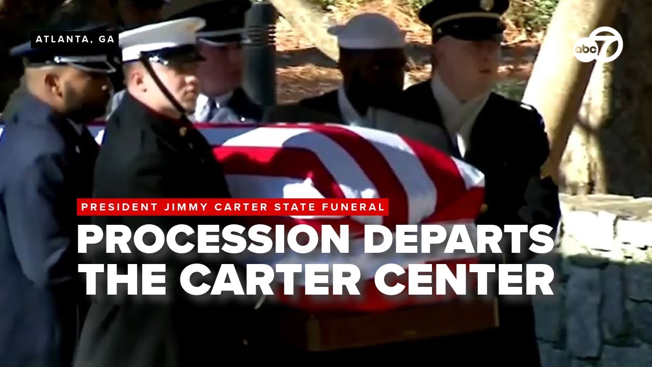Jimmy Carter's funeral procession departs Carter Center in Atlanta